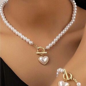 Elegant Pearl Necklace with Gold Heart Pendant